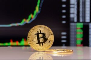 a bit coin sitting on top of a table