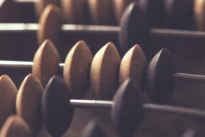 a bunch of wooden spoons are lined up