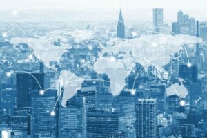 a cityscape with a world map in the middle