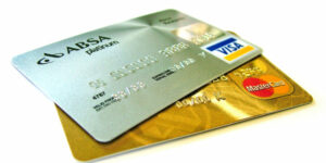 two credit cards sitting on top of each other
