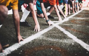 a group of soccer players standing in a line