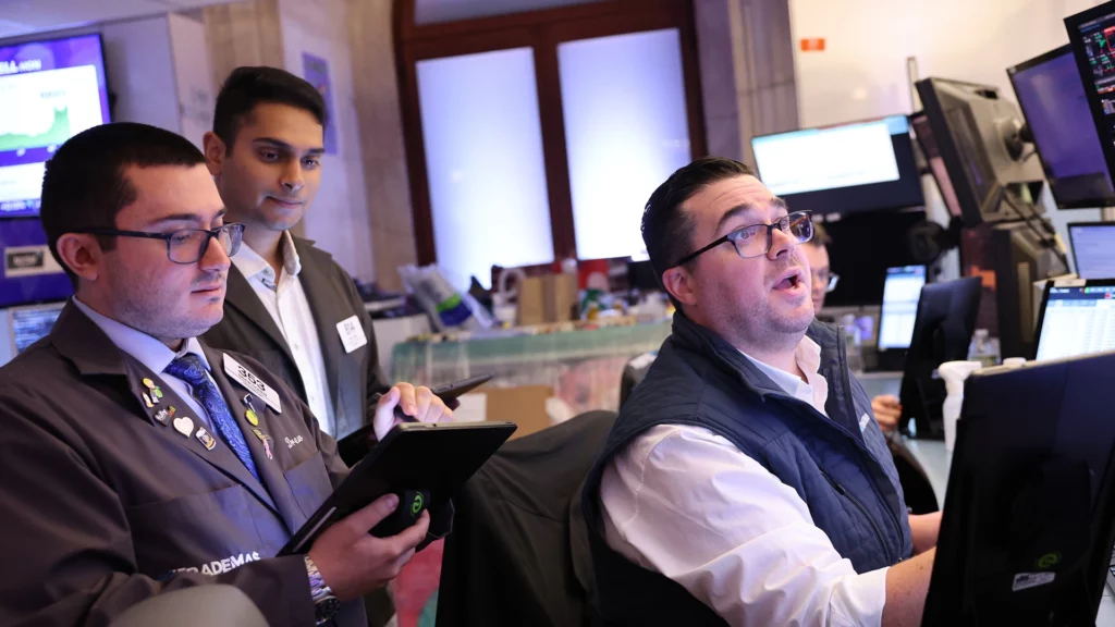 Traders looking at digital asset investment products.