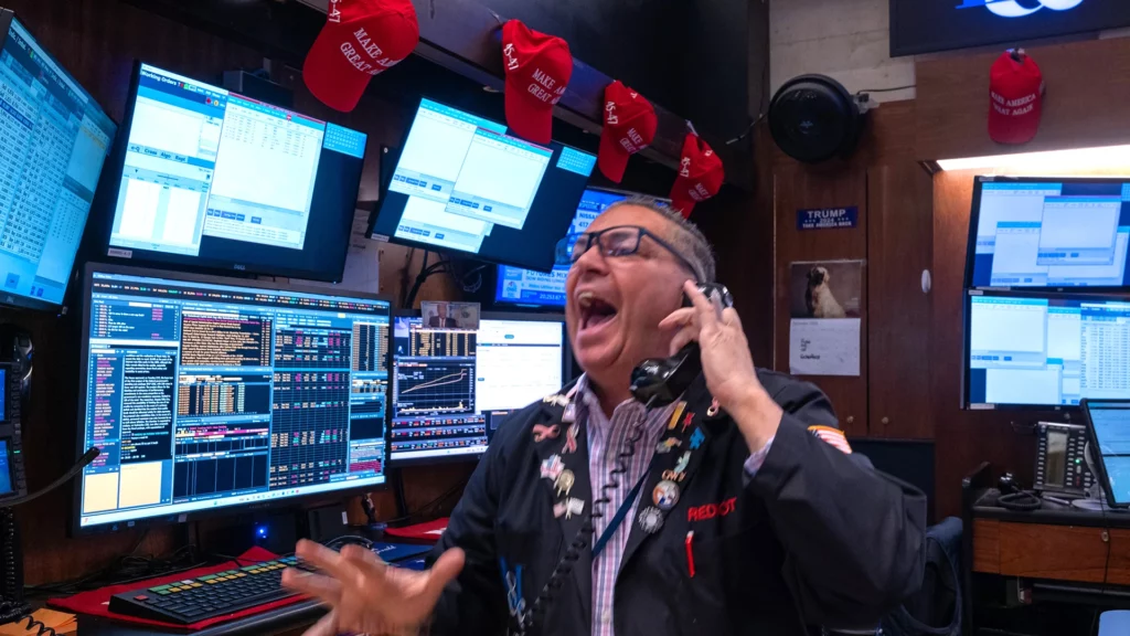 Trader looking at Bitcoin, Ethereum ETFs.