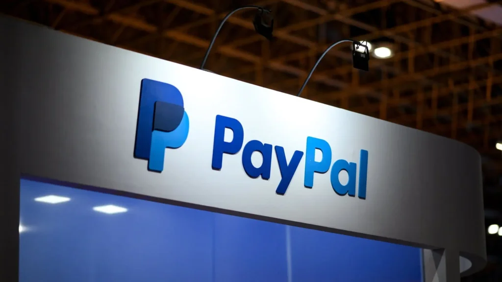 PayPal and the NCA say 39% of US merchants accept crypto, led by large enterprises.